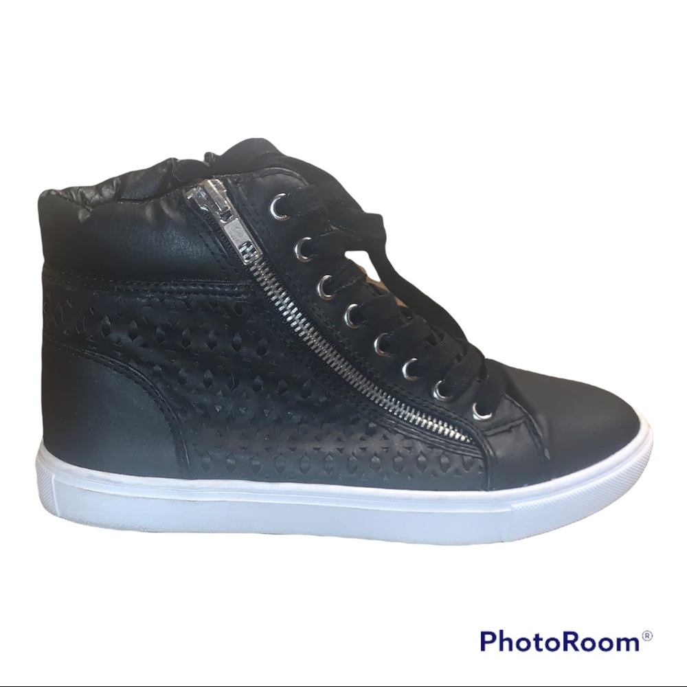 slightly worn Steve Madden hightop sneakers
